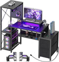 Small Gaming Desk with 2 Fabric Drawers - Reversible Computer Desk with Power Outlet & LED Lights, 49' Office Desk with Monitor Stand & Storage Shelves, Writing Study Table with Pegboard, Black